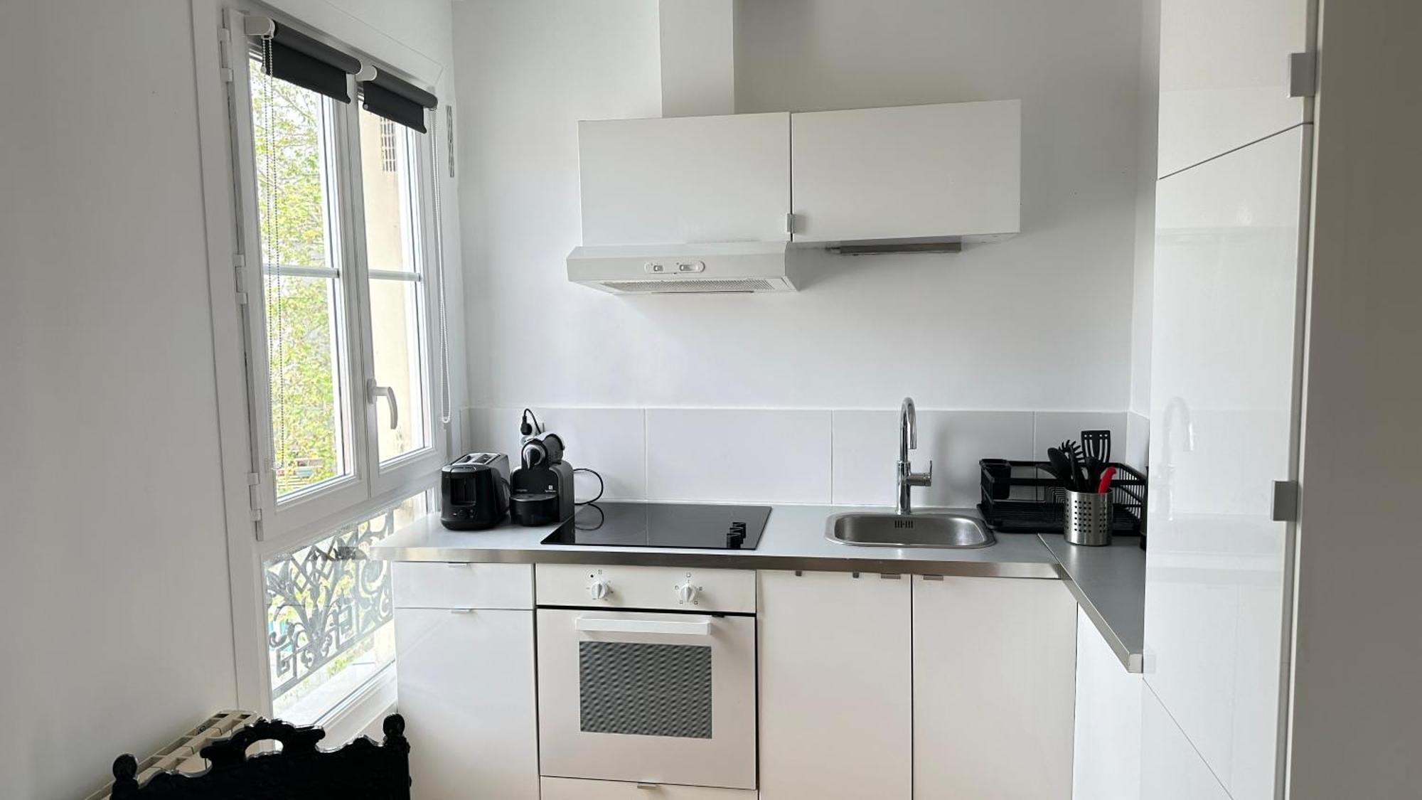 Ferienwohnung Charmant Studio Au Coeur Du 18E Paris Exterior foto